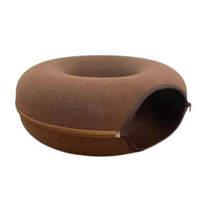 Brown pet bed with a zipper on a white background