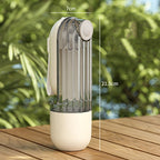 Transparent spray bottle with white base on a wooden surface, measurement labels shown.